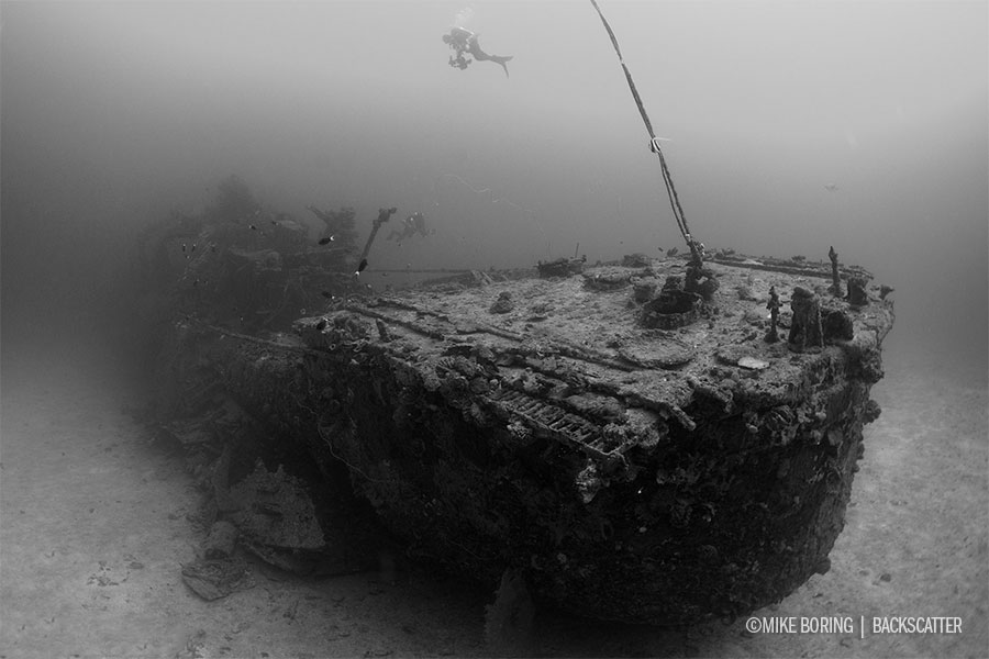 ©Mike Boring - Truk Lagoon - Becca on Wreck shooting with the Nauticam WACP Lens Port